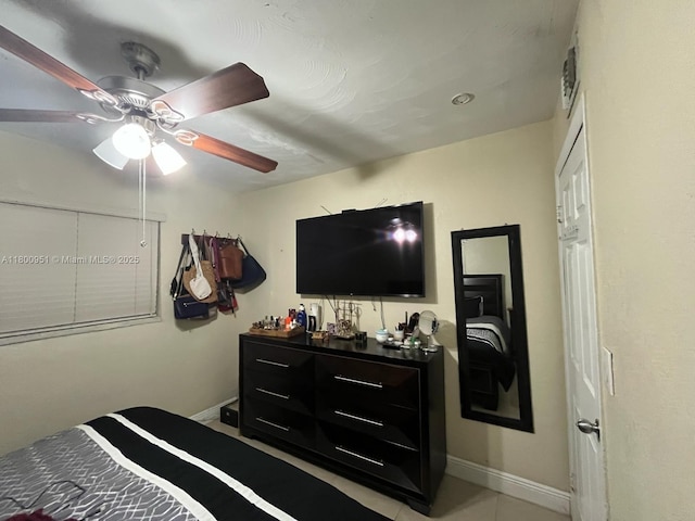 519 S 61st Ave, Hollywood, FL 33023 - bedroom with baseboards, ceiling fan, and light tile patterned floors