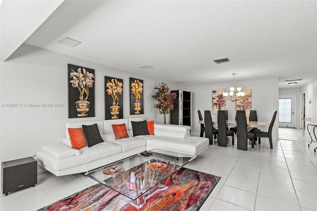 1621 NW 20th Ave Unit 203, Delray Beach, FL 33445 - bedroom featuring light tile patterned flooring, ceiling fan, a textured ceiling, and an office area
