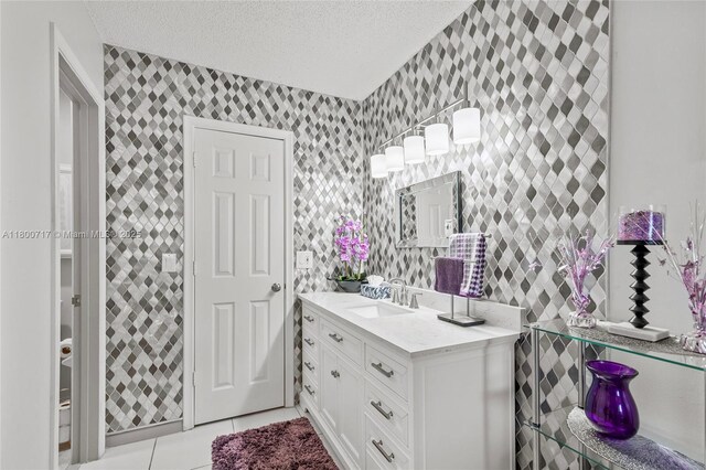 1621 NW 20th Ave Unit 203, Delray Beach, FL 33445 - foyer entrance with marble finish floors and a textured ceiling