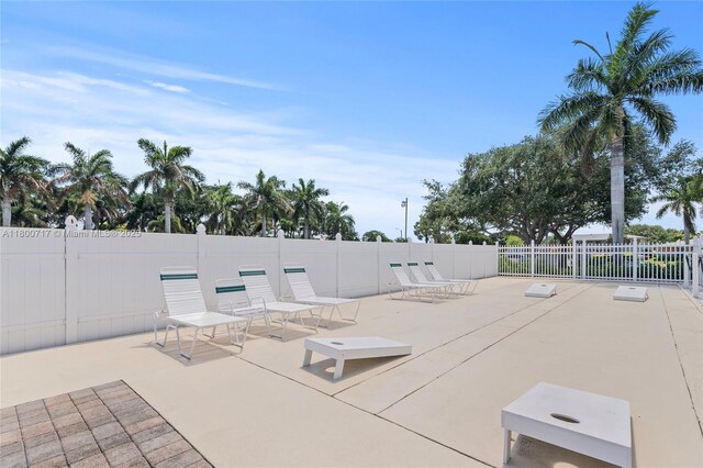 1621 NW 20th Ave Unit 203, Delray Beach, FL 33445 - bedroom featuring a textured ceiling and a ceiling fan