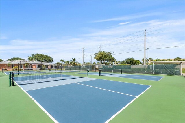 1621 NW 20th Ave Unit 203, Delray Beach, FL 33445 - bedroom featuring a textured ceiling and ceiling fan