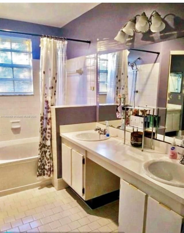 3734 NW 107th Way, Sunrise, FL 33351 - bathroom featuring tile patterned flooring, shower / tub combo, and double vanity