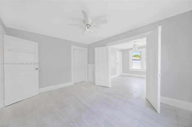 1621 Van Buren St, Hollywood, FL 33020 - unfurnished bedroom featuring baseboards, a ceiling fan, and a closet