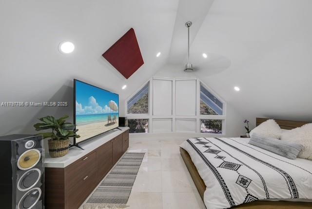 bedroom featuring vaulted ceiling