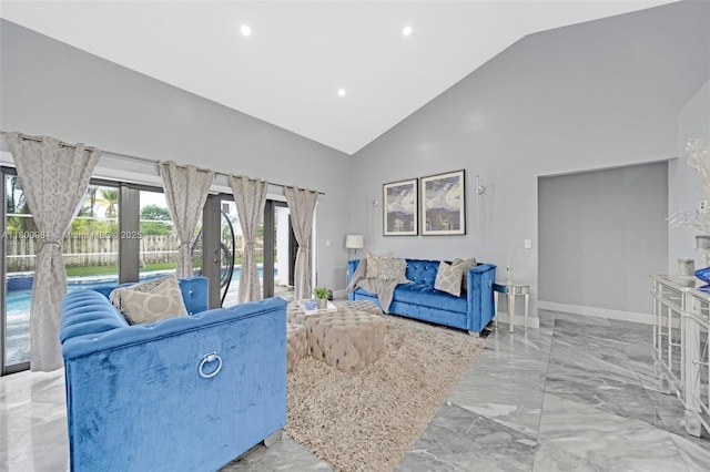 5260 NW 74th Ter, Lauderhill, FL 33319 - living area with french doors, marble tiled flooring, high vaulted ceiling, recessed lighting, and baseboards