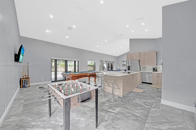 5260 NW 74th Ter, Lauderhill, FL 33319 - recreation room with light marble finish floors, billiards table, high vaulted ceiling, baseboards, and recessed lighting