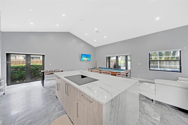 5260 NW 74th Ter, Lauderhill, FL 33319 - kitchen with modern cabinets, light marble finish floors, french doors, light brown cabinets, and recessed lighting