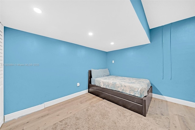 5260 NW 74th Ter, Lauderhill, FL 33319 - bedroom featuring wood finished floors, baseboards, and recessed lighting