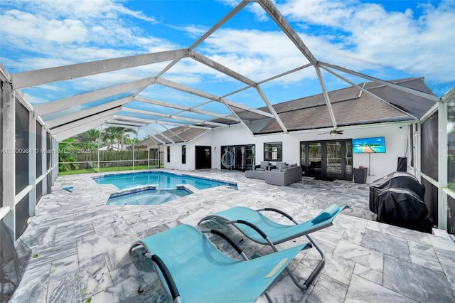 5260 NW 74th Ter, Lauderhill, FL 33319 - view of swimming pool with a patio area, an outdoor hangout area, a pool with connected hot tub, area for grilling, and a lanai