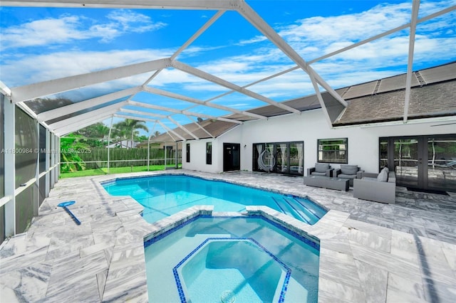 5260 NW 74th Ter, Lauderhill, FL 33319 - view of pool featuring a pool with connected hot tub, french doors, a patio, an outdoor hangout area, and glass enclosure