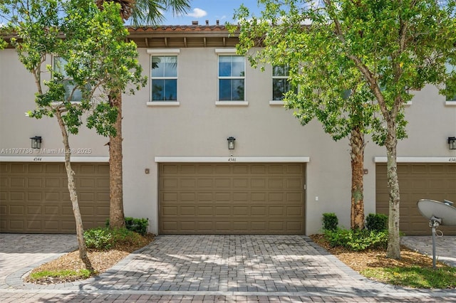 4346 Cascada Cir, Cooper City, FL 33024 - multi unit property with stucco siding and an attached garage