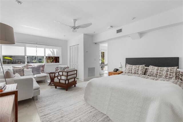 4532 Sheridan Ave, Miami Beach, FL 33140 - bedroom with multiple windows, a closet, and a ceiling fan