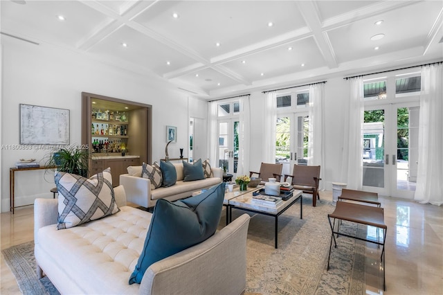 living room featuring french doors, coffered ceiling, recessed lighting, and bar area