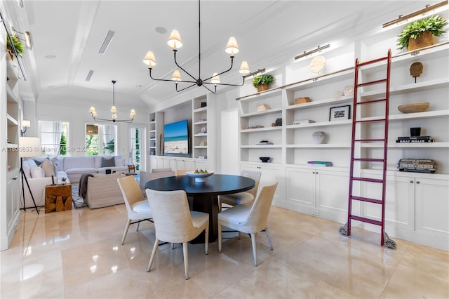 dining room with a chandelier, built in shelves, and lofted ceiling