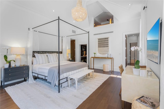 bedroom featuring hardwood / wood-style flooring
