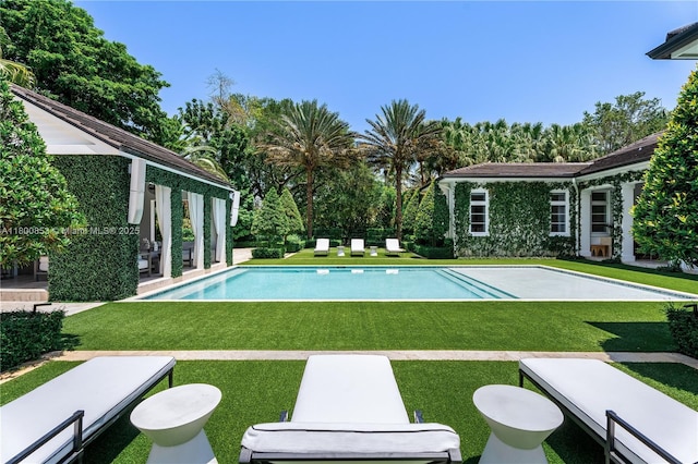 swimming pool with a yard