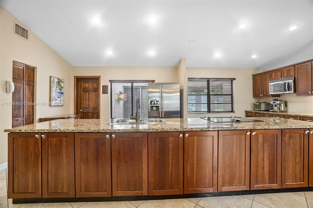 15251 SW 154th Ave, Miami, FL 33187 - kitchen with stainless steel appliances, a sink, light stone counters, light tile patterned flooring, and recessed lighting