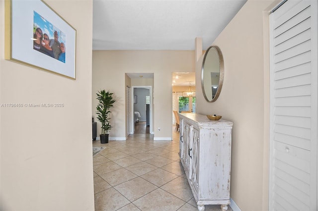 15251 SW 154th Ave, Miami, FL 33187 - hall featuring light tile patterned floors and baseboards