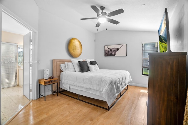 15251 SW 154th Ave, Miami, FL 33187 - bedroom with vaulted ceiling, light wood finished floors, a ceiling fan, and baseboards