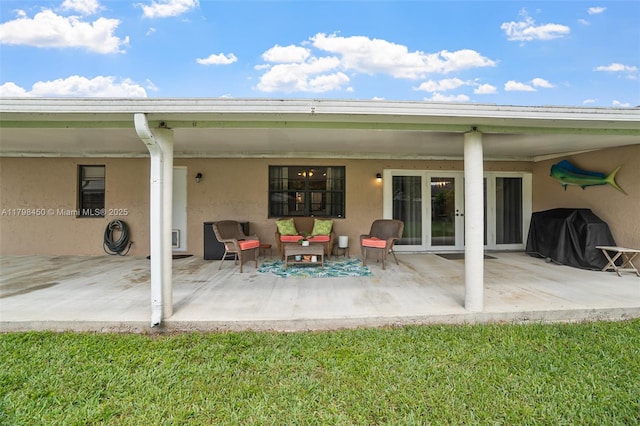 15251 SW 154th Ave, Miami, FL 33187 - back of house with stucco siding and a patio area