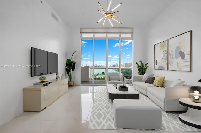 7910 Harbor Island Dr Unit 1208, North Bay Village, FL 33141 - living area featuring floor to ceiling windows, light tile patterned flooring, and a chandelier