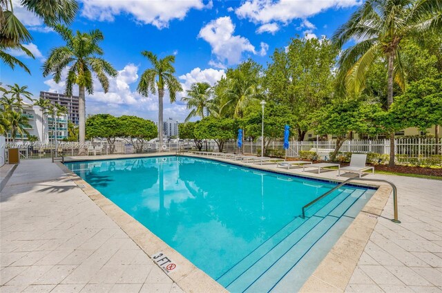7910 Harbor Island Dr Unit 1208, North Bay Village, FL 33141 - community pool featuring fence and a patio