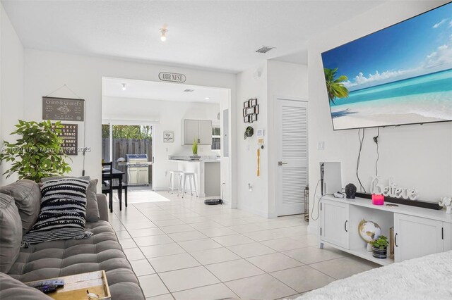 550 NE 4th Ave, Florida City, FL 33034 - living room with light tile patterned flooring