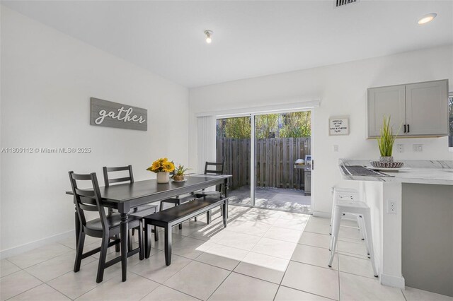 550 NE 4th Ave, Florida City, FL 33034 - living area with light tile patterned floors and baseboards