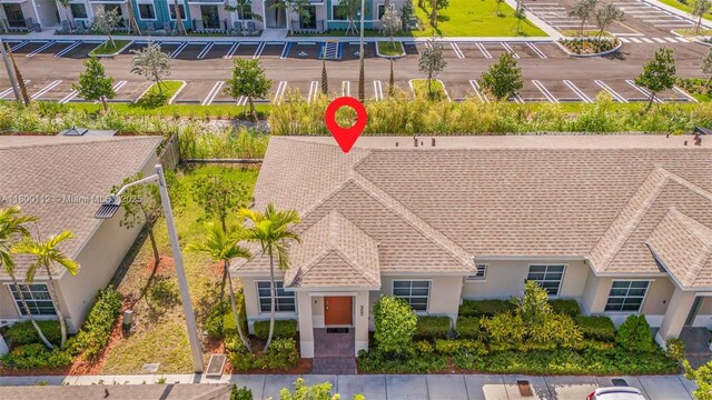 550 NE 4th Ave, Florida City, FL 33034 - view of side of property featuring cooling unit, a patio area, fence, and stucco siding