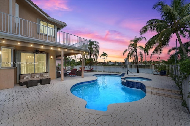 1106 NW 180th Ave, Pembroke Pines, FL 33029 - view of swimming pool with a patio area, an outdoor living space, a pool with connected hot tub, fence, and a ceiling fan