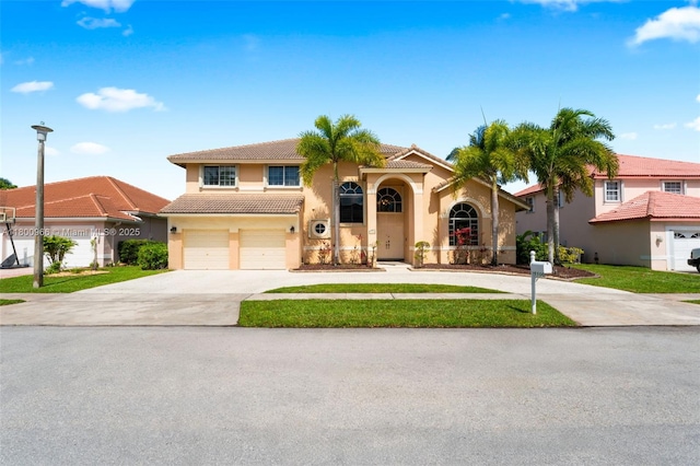 1106 NW 180th Ave, Pembroke Pines, FL 33029 - mediterranean / spanish-style home with concrete driveway, stucco siding, a tile roof, and an attached garage