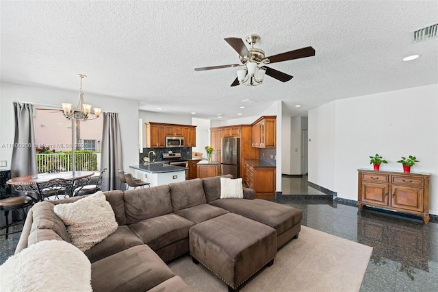 1106 NW 180th Ave, Pembroke Pines, FL 33029 - living room featuring a chandelier, baseboards, a ceiling fan, recessed lighting, and a textured ceiling