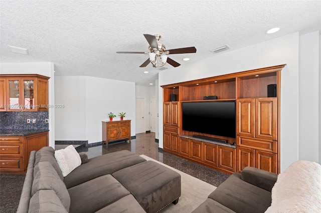 1106 NW 180th Ave, Pembroke Pines, FL 33029 - living room featuring a ceiling fan, recessed lighting, a textured ceiling, granite tiled floors, and baseboards
