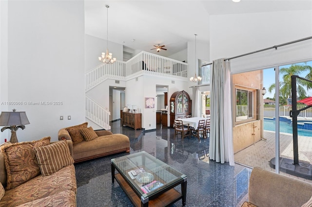 1106 NW 180th Ave, Pembroke Pines, FL 33029 - living area with a chandelier, stairs, granite tiled floors, and a towering ceiling