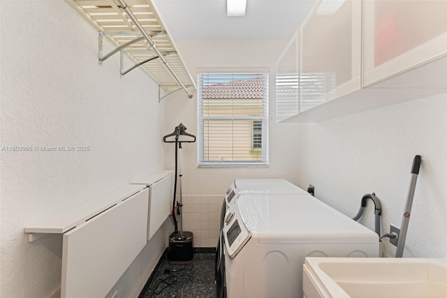 1106 NW 180th Ave, Pembroke Pines, FL 33029 - laundry area featuring washing machine and clothes dryer and cabinet space