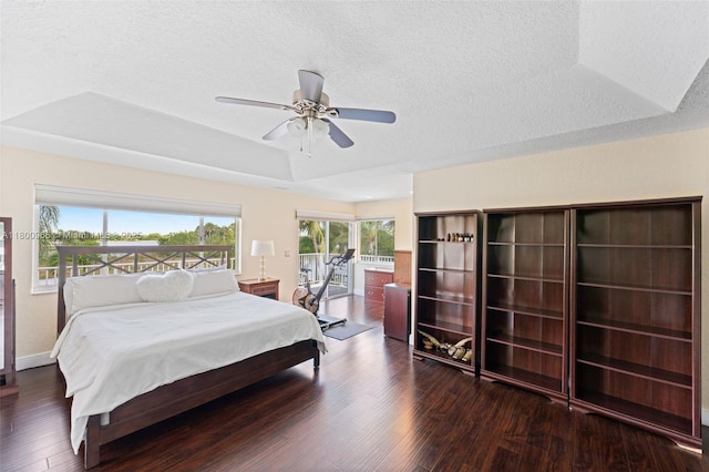1106 NW 180th Ave, Pembroke Pines, FL 33029 - bedroom with access to outside, wood finished floors, a textured ceiling, a tray ceiling, and a ceiling fan
