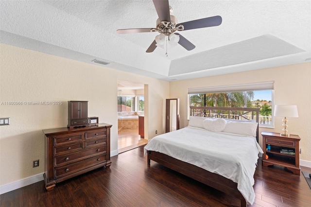 1106 NW 180th Ave, Pembroke Pines, FL 33029 - bedroom featuring wood finished floors, baseboards, a raised ceiling, ceiling fan, and a textured ceiling