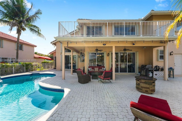 1106 NW 180th Ave, Pembroke Pines, FL 33029 - view of pool with fence, a ceiling fan, a patio area, and an outdoor hangout area