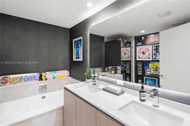 488 NE 18th St Unit 715, Miami, FL 33132 - full bathroom featuring a garden tub, double vanity, and recessed lighting