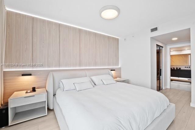 488 NE 18th St Unit 715, Miami, FL 33132 - bedroom with light wood finished floors