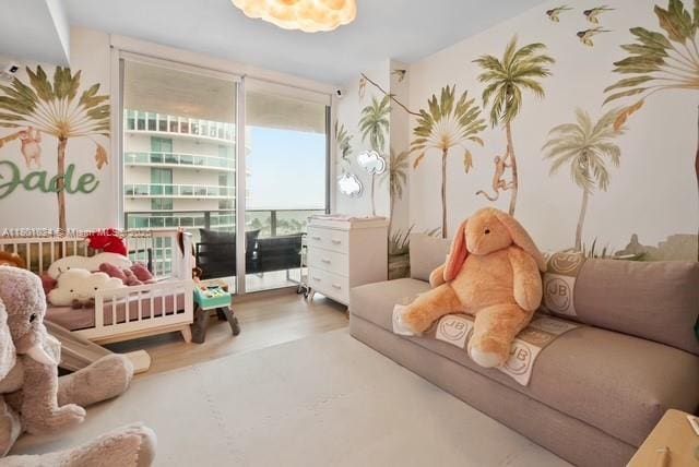 488 NE 18th St Unit 715, Miami, FL 33132 - sitting room featuring wood finished floors and floor to ceiling windows