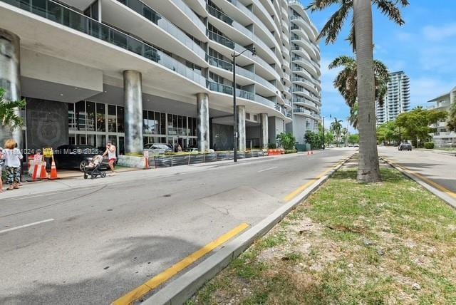 488 NE 18th St Unit 715, Miami, FL 33132 - view of asphalt road featuring curbs