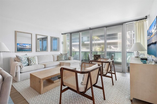9401 Collins Ave Unit 505, Surfside, FL 33154 - living area with floor to ceiling windows