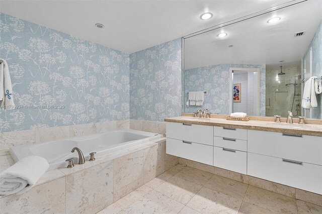 9401 Collins Ave Unit 505, Surfside, FL 33154 - full bathroom with a stall shower, a garden tub, double vanity, recessed lighting, and wallpapered walls