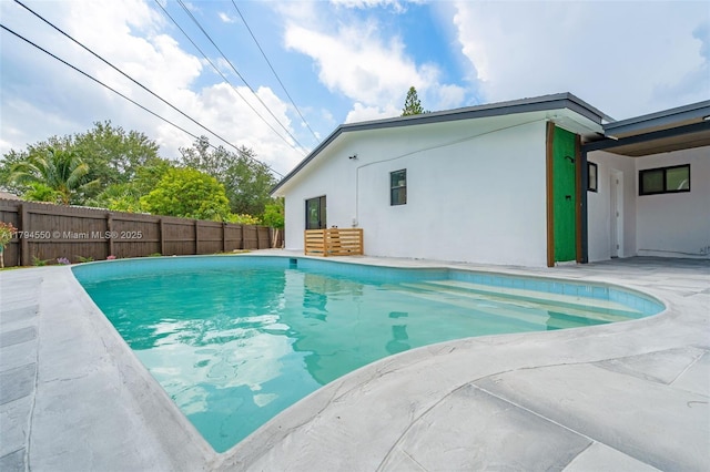3732 SW 16th St, Fort Lauderdale, FL 33312 - view of swimming pool featuring fence and a patio