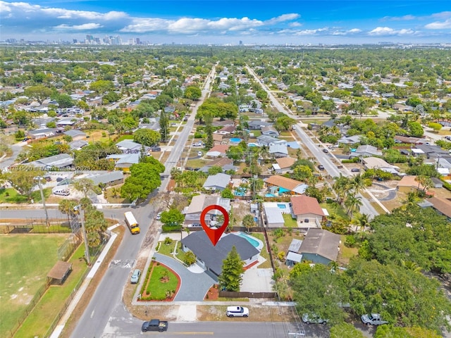 aerial overview of property's location with nearby suburban area