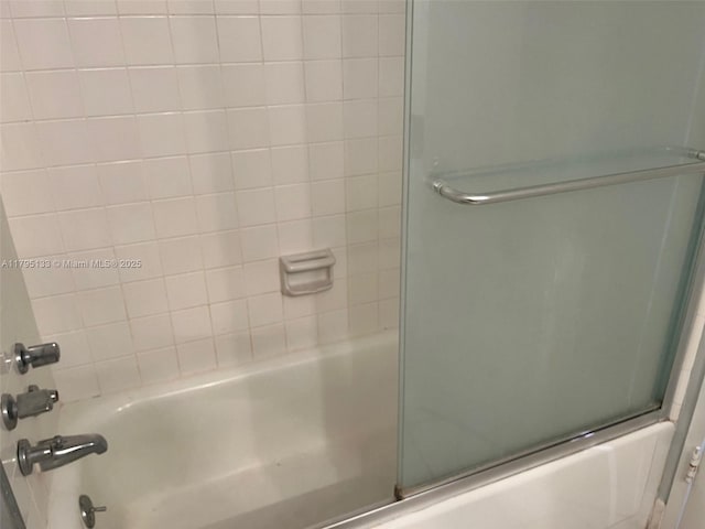900 Bay Dr Unit 913, Miami Beach, FL 33141 - bathroom featuring enclosed tub / shower combo