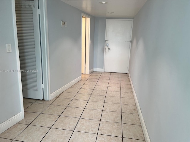 900 Bay Dr Unit 913, Miami Beach, FL 33141 - corridor featuring light tile patterned floors, recessed lighting, and baseboards