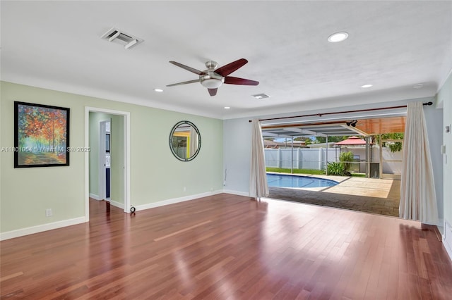 5261 NE 18th Ter, Fort Lauderdale, FL 33308 - unfurnished room featuring ceiling fan, baseboards, recessed lighting, and wood finished floors