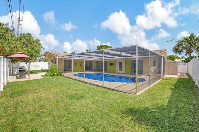 5261 NE 18th Ter, Fort Lauderdale, FL 33308 - back of property with a patio area, a tiled roof, and a lanai